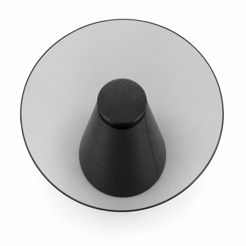 Lanott ST103 side table in Black Leather, high-angle top view on white background, fine leather grain