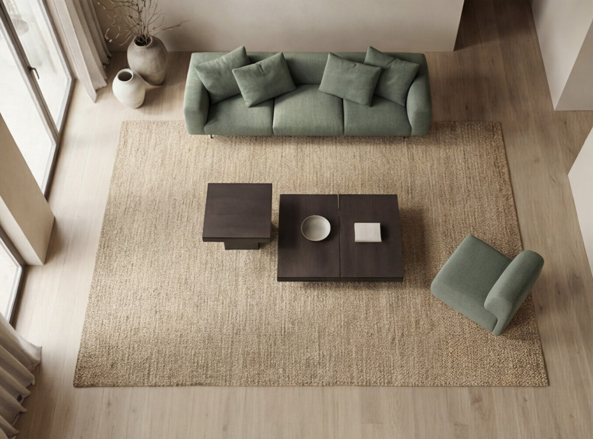 Green Lanott sofa and armchair with dark coffee tables