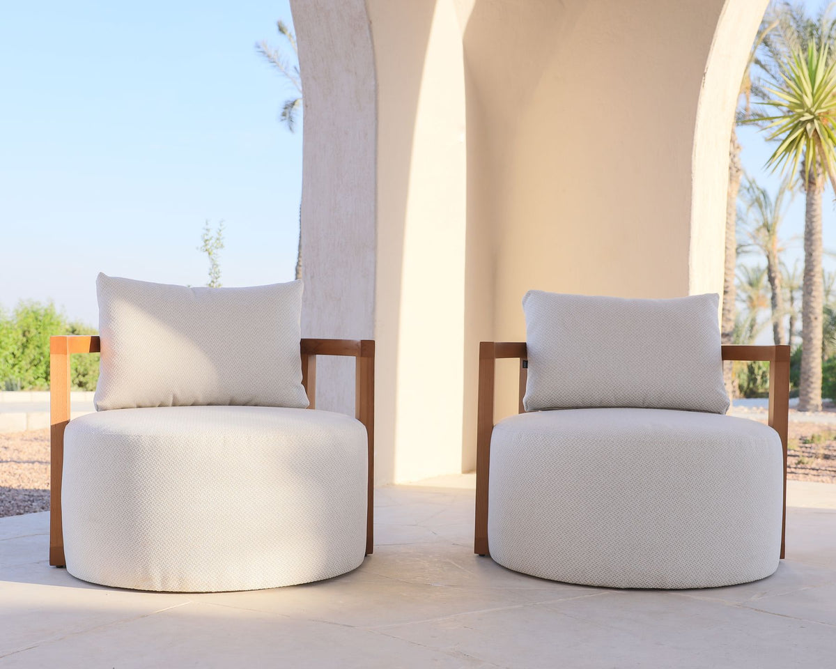 Lanott armchairs facing each other outdoors